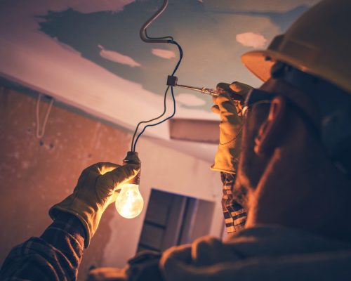 working-contractor-electrician-ATKFLJD-scaled
